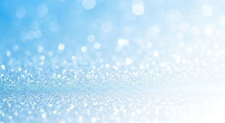 Bokeh sparkling light effect creating a glitter background. Abstract illuminated surface for festive celebration and happy holiday design.