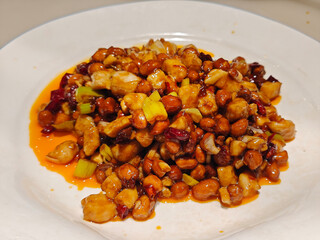 fresh  kung pao chicken in the white plate for eating