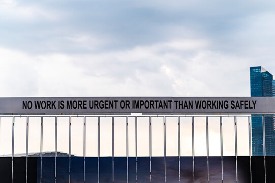 Safety first message on industrial fence,