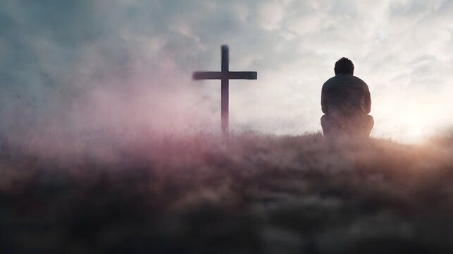 Person praying in front of a cross with a spiritual atmospheric setting