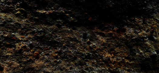 Dark rough stone wall background in vintage style for graphic design or wallpaper.