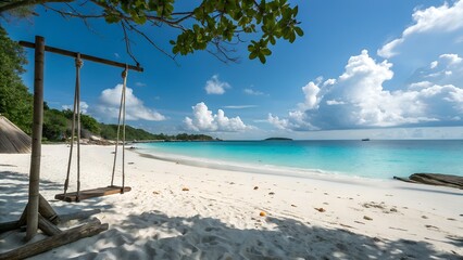 Fototapeta premium Tropical beach paradise with wooden swing and turquoise water