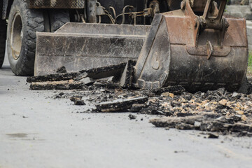 Tractor operated ditch digging for drainage concrete sewage a pipe installation, Pakistan 14-August-2025, Aerial view of scoop excavators in action on a construction site, showing progress