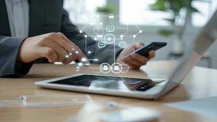 A person analyzes data using a tablet and smartphone while interacting with digital visualizations in a dynamic workspace