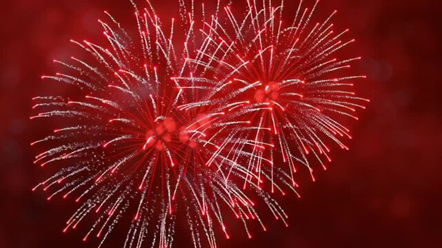 Vibrant fireworks burst against a deep red sky, capturing the excitement of celebration, perfect for New Year's Eve or Fourth of July imagery, invokes joy and awe