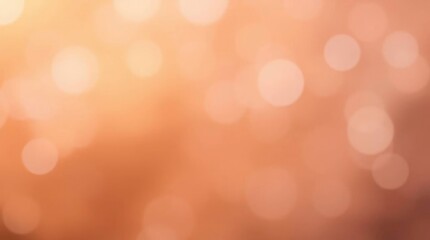 Blurred abstract background with bokeh lights in warm shades of orange peach and brown
