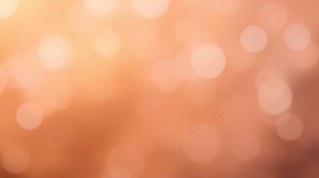 Blurred abstract background with bokeh lights in warm shades of orange peach and brown