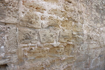 Old stone wall background. Old stone wall texture. Old stone wall background