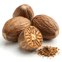 Whole and halved nutmeg seeds with ground spice whole nutmeg
