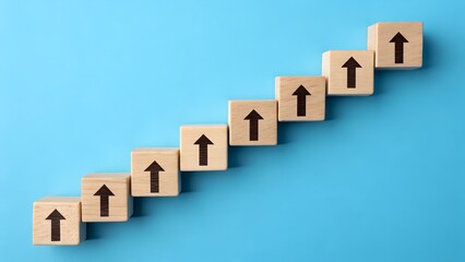 Naklejka premium Progress and Growth Visualization – Upward Arrow Blocks in Staircase Formation, Blue Background, Abstract Success Concept