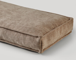 Comfortable brown floor cushion resting on floor
