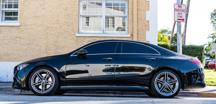 Miami, Florida, USA - November 23, 2024: Mercedes Benz CLA sedan. Luxury car of Mercedes Benz CLA AMG sedan type. Car of Mercedes Benz parked outdoor. Mercedes Benz CLA, side view.