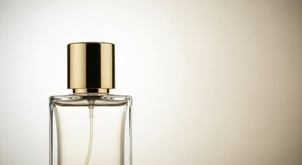 Elegant Clear Glass Perfume Bottle with Gold Cap on Soft Gradient Background