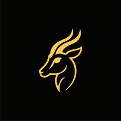 Gold outline of a gazelle's head on a black background.