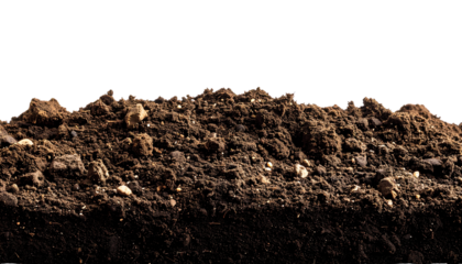 A mound of dark brown soil against a black background with scattered pixelated edges and soft shadows