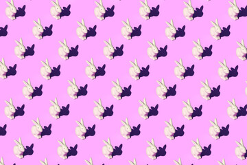 Pattern composition of Easter bunnies on pastel red background. Minimalist isometric concept. 3D rendering illustration.