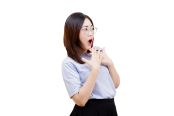 Asian young beautiful woman expresses surprise with her mouth open and hands on her chest, wearing glasses and a light blue shirt.