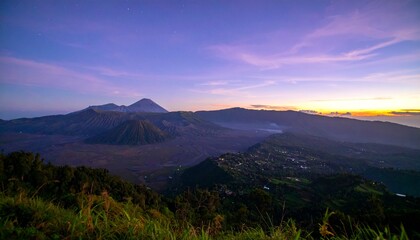 Breathtaking volcanic landscape at dawn with majestic mountains and a serene sky