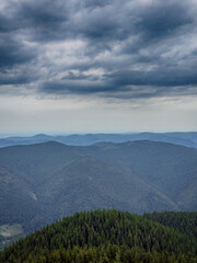 A somber Carpathian landscape, majestic and timeless under cloudy skies.