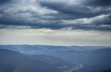 A somber Carpathian landscape, majestic and timeless under cloudy skies.