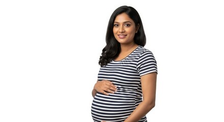 A pregnant woman in a striped shirt is holding her belly and smiling on a white background space