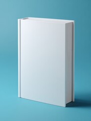 white hard cover book standing on edge