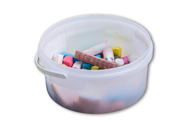 plastic bowl with crayons for children
