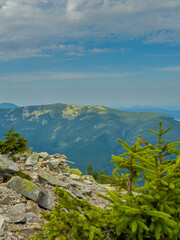 Sunny Carpathian peaks: green valleys and crystal clear skies.