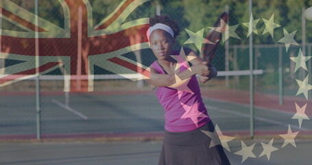 Swinging female tennis player hitting backhand on court with net, British flag and EU stars overlay