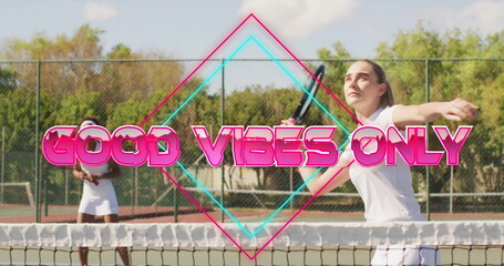 Female tennis player executing forehand shot on outdoor hard court, with racket and GOOD VIBES ONLY