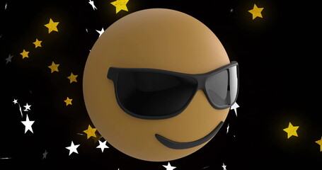 Fototapeta premium Floating amber emoticon sphere wearing black shades in cosmic starfield, with white and gold stars