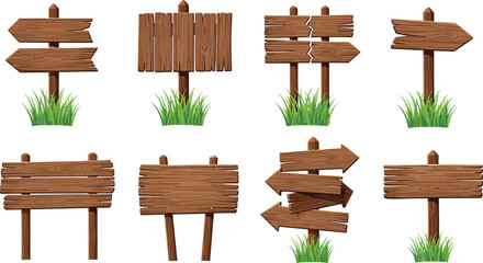 Set of wooden rustic directional signposts with arrows and blank boards, standing in green grass, nature wayfinding outdoor signs