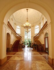 Elegant Architectural Staircase with Chandelier in Luxurious Interior Space