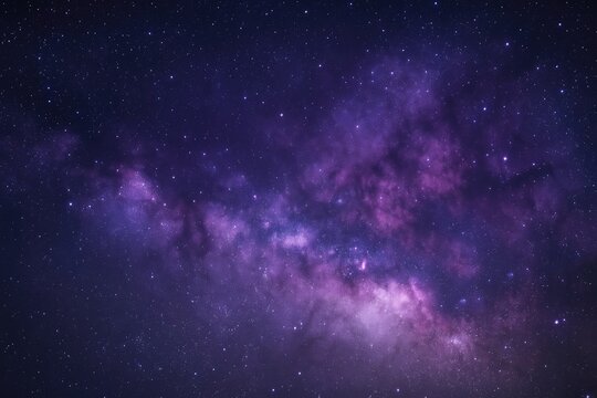 Expansive purple and pink galaxy with swirling cosmic dust and a dense field of stars