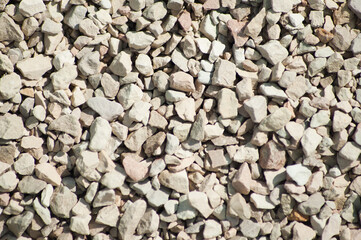 The photo shows a close-up of crushed stone