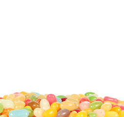 Delicious sweets jelly beans candies pile isolated on white background