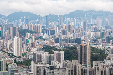 View of Hong Kong and Kowloon from Lion Rock Head. Panorama of Hong Kong, skyscrapers and nature.