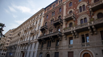 Obraz premium Italian Building Facade with Balconies and Shutters
