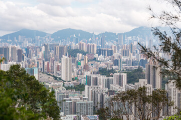 View of Hong Kong and Kowloon from Lion Rock Head. Panorama of Hong Kong, skyscrapers and nature.