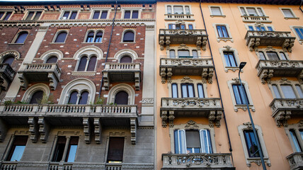 Obraz premium Italian Building Facade with Balconies and Shutters
