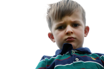 little boy looking down