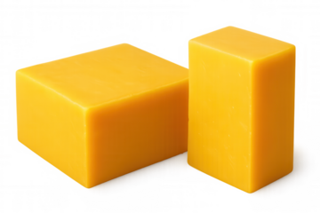 Two solid, rectangular pieces of vibrant yellow soap stand on a transparent background, ready for use in hygiene and cleansing routines