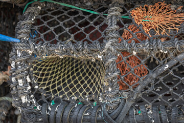 Close up of the entrance funnel of a lobster and crab pot used in coastal fishing
