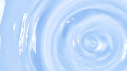 Ripples of Purity: Abstract image of concentric circles created by a drop of water. Capture the...