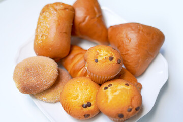 home made bakery foods on white plate