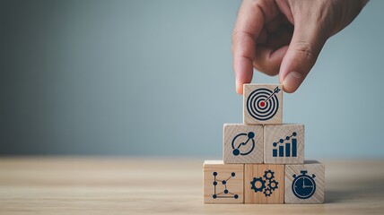 Building Business Success Conceptual Tower of Wooden Blocks with Strategy and Goal Setting