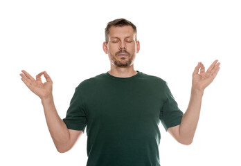 Fototapeta premium Panic attack. Man meditating to calm down on white background