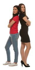 Obraz premium Two young women standing back to back with arms crossed isolated on transparent background