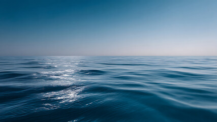 Obraz premium Serene Ocean View: Calm Blue Waters and Clear Sky Horizon