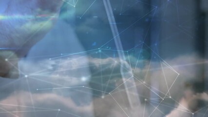 Technology network overlay floating as lab scientist handling pipette releasing red liquid for test - Powered by Adobe